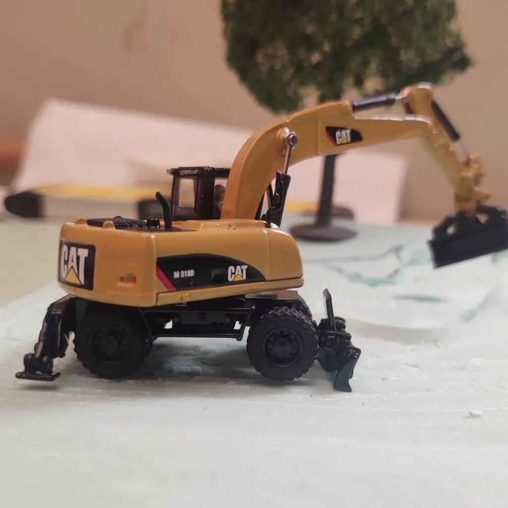 Wheeled Excavator on 1:87 scale civil engineering diorama. HO Scale. Dabldo. Brian E. Wagner, PE